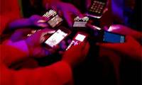 tweeting (select to view enlarged photo)