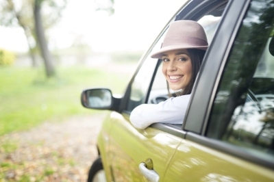young person in car